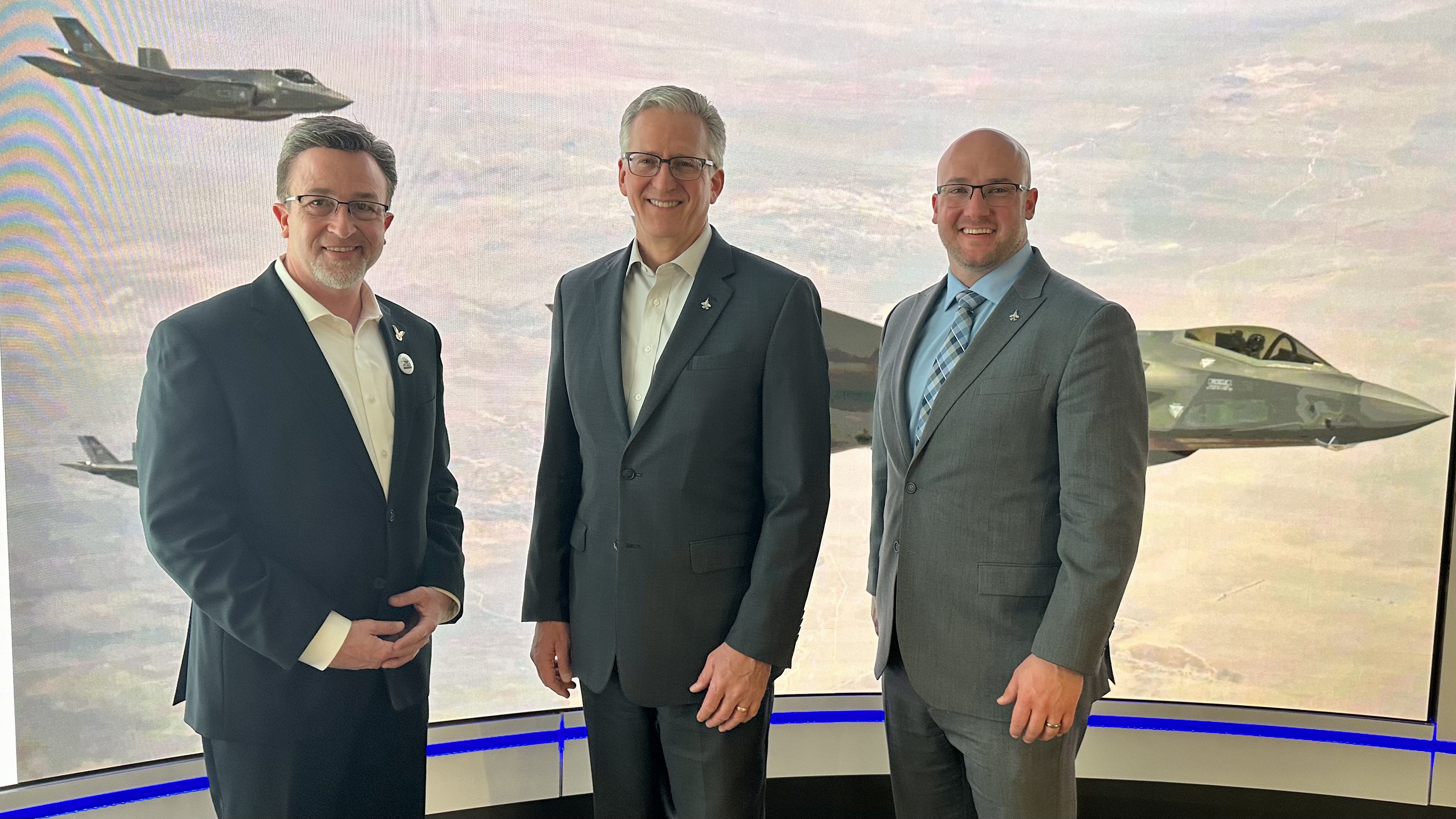 Tracy Solomon and Nate Witsaman from TEVET attend the F-35 Supplier Conference with Doug Wilhelm, Deputy and VP of the F-35 Program